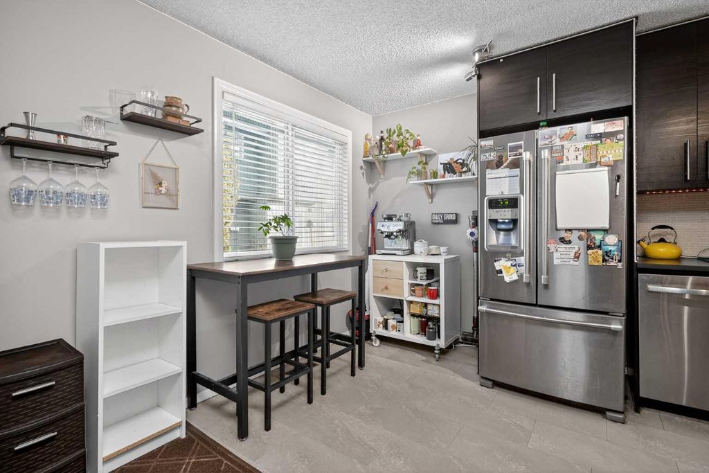 Photo of 6503 Ranchview Drive NW #28, Calgary, AB T3G 1P2 (MLS # A2291262)