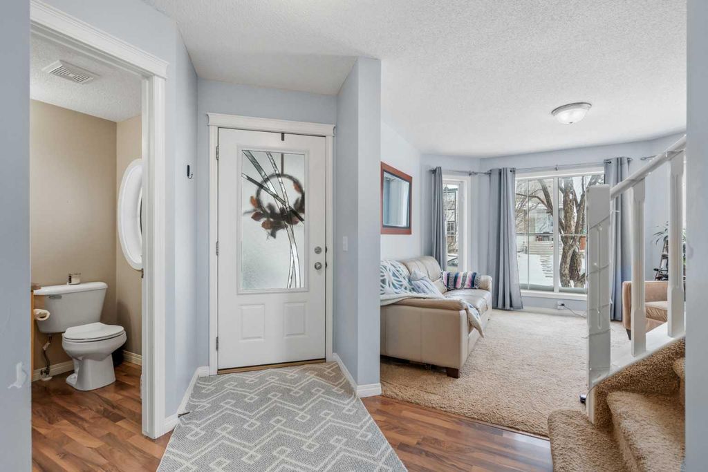 Photo of 4 Tuscany Ridge Way NW, Calgary, AB T2E 8A2 (MLS # A2287107)