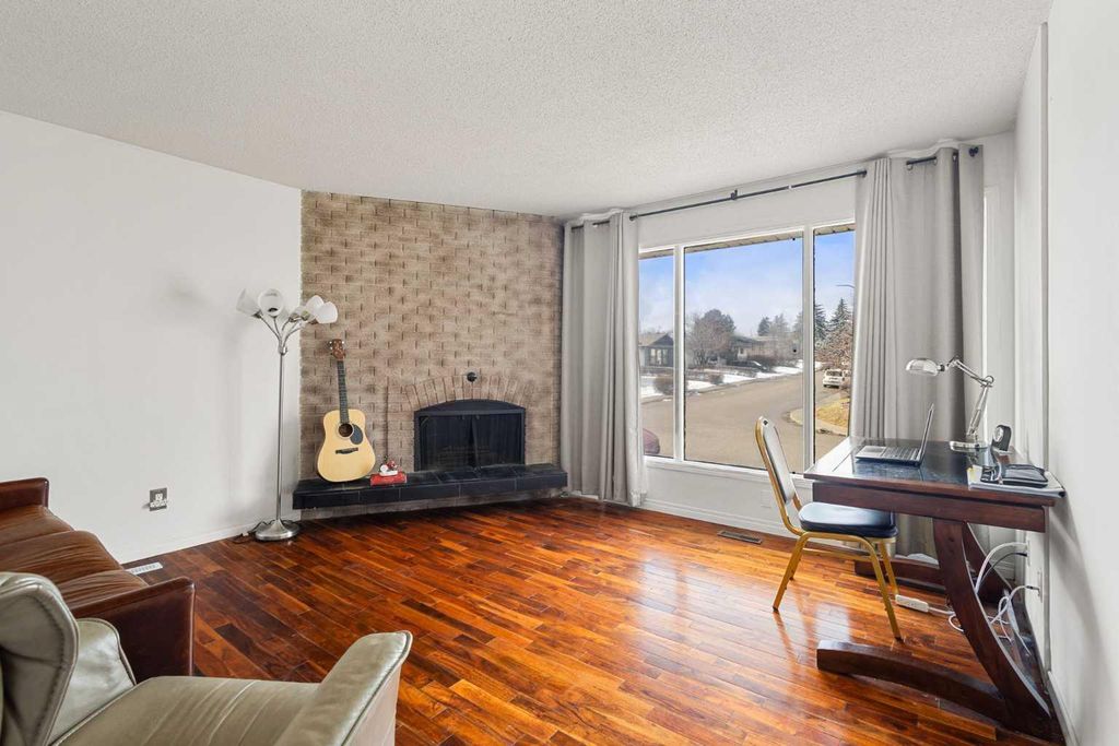 Photo of 214 Huntington Close NE, Calgary, AB T2K 5B2 (MLS # A2299935)