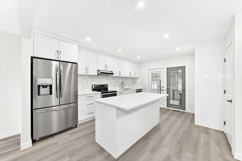 Photo of 3319 Radcliffe Drive SE, Calgary, AB T2A 5X3 (MLS # A2349357)