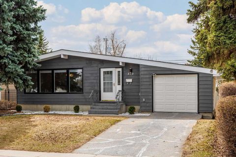 Photo of 310 Wascana Crescent SE, Calgary, AB T2J 1H5 (MLS # A2305222)