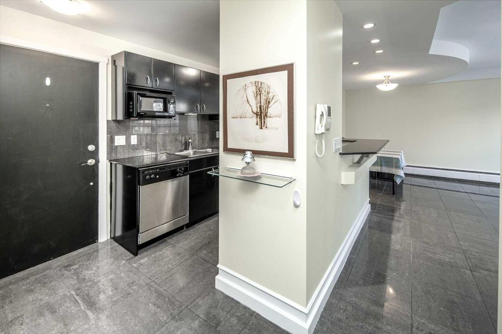 Photo of 706 15 Avenue SW #204, Calgary, AB T2R 0R7 (MLS # A2289665)