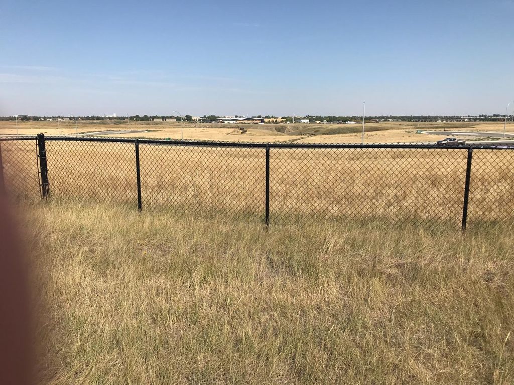 Photo of 118 Sandstone Road S, Lethbridge, AB T1K 8J1 (MLS # A1037618)