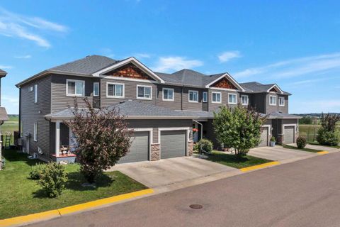 Photo of 76 Terrace Heights Drive #10, Lacombe, AB T4L 0E5 (MLS # A2326378)