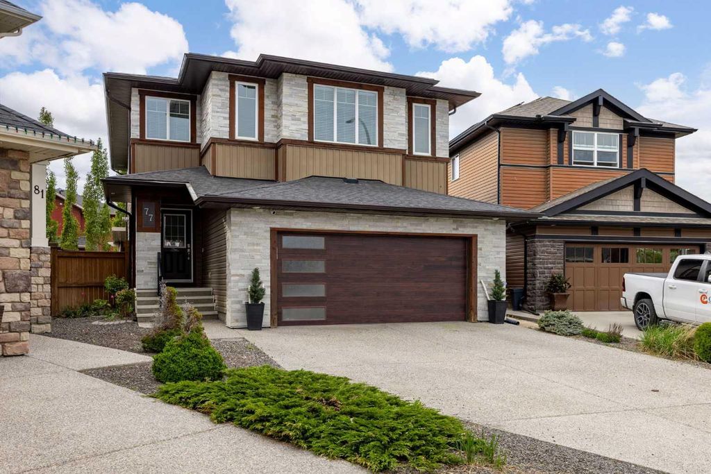 Photo of 77 Cougar Ridge Cove SW, Calgary, AB T3H 0S5 (MLS # A2315693)