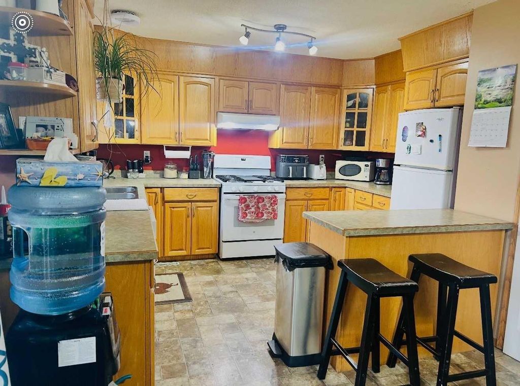 Photo of 10311 106 Avenue, High Level, AB T0H 1Z0 (MLS # A2307916)