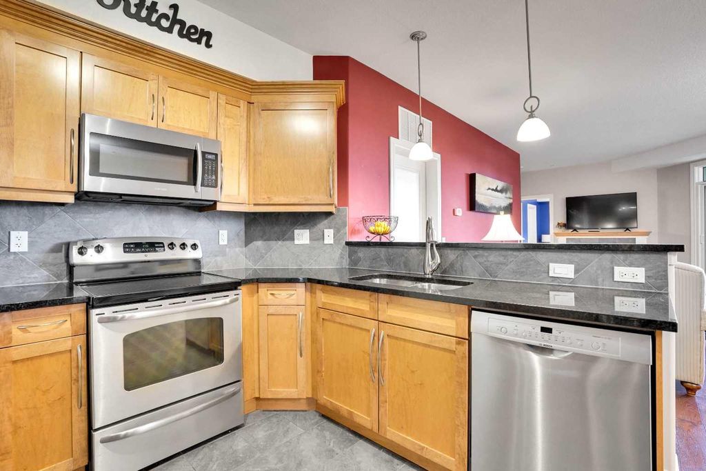 Photo of 2330 Fish Creek Boulevard SW #1132, Calgary, AB T2Y 0L1 (MLS # A2290272)