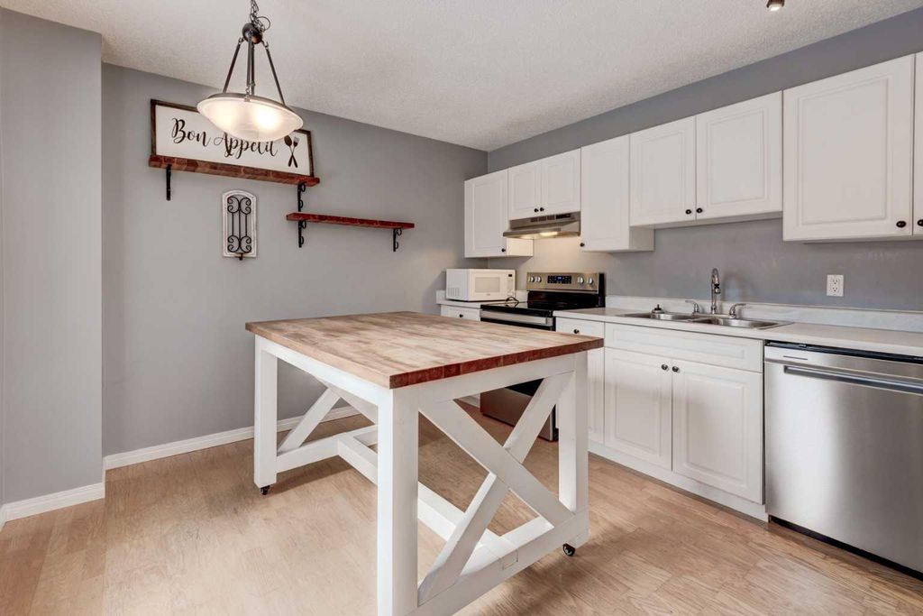 Photo of 3620 51 Street SW #14, Calgary, AB T3E 6N7 (MLS # A2293263)