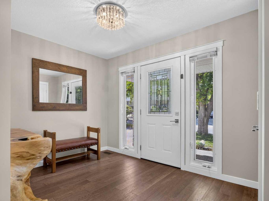 Photo of 30 Wimbledon Drive SW, Calgary, AB T3C 3J4 (MLS # A2344068)