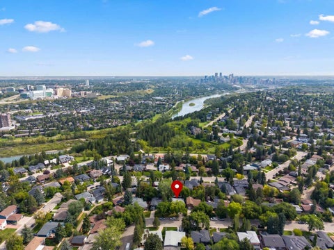 Photo of 30 Wimbledon Drive SW, Calgary, AB T3C 3J4 (MLS # A2344068)
