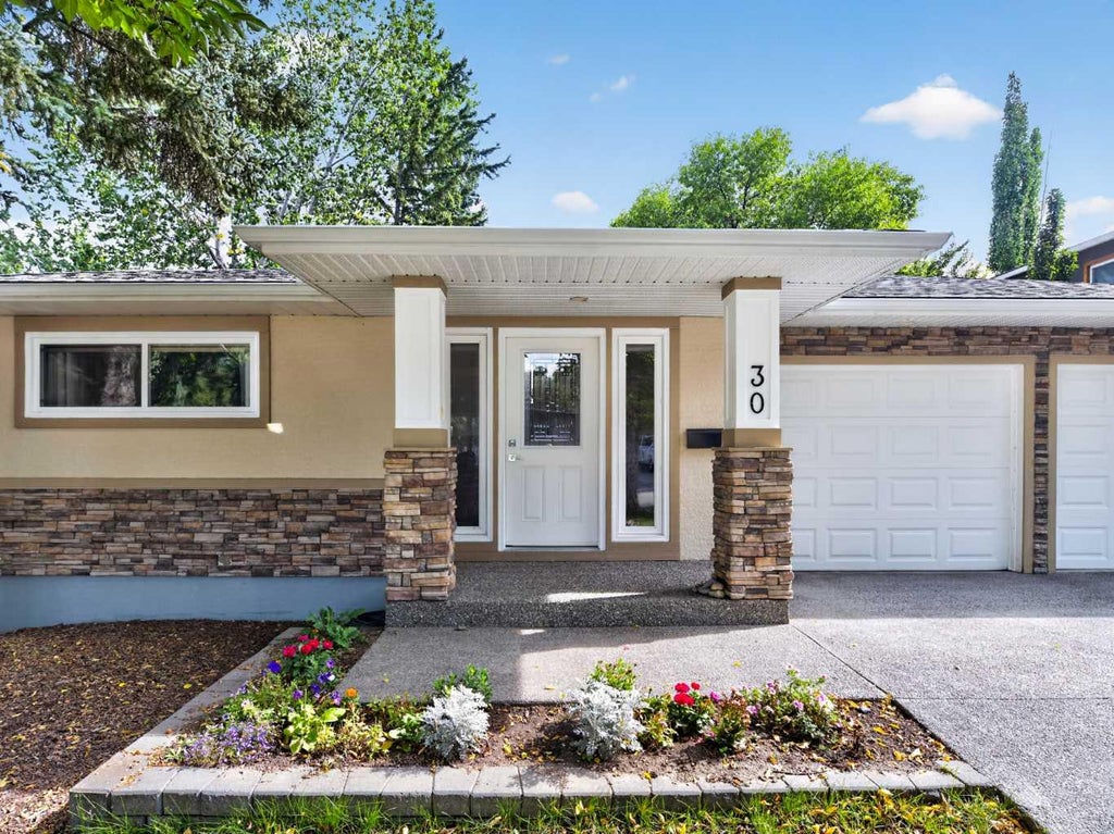 Photo of 30 Wimbledon Drive SW, Calgary, AB T3C 3J4 (MLS # A2344068)