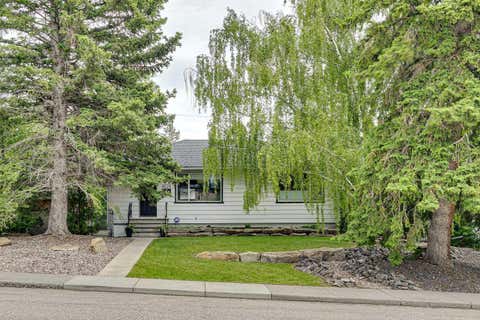 Photo of 4024 Grove Hill Road SW, Calgary, AB T3E 4E6 (MLS # A2320411)
