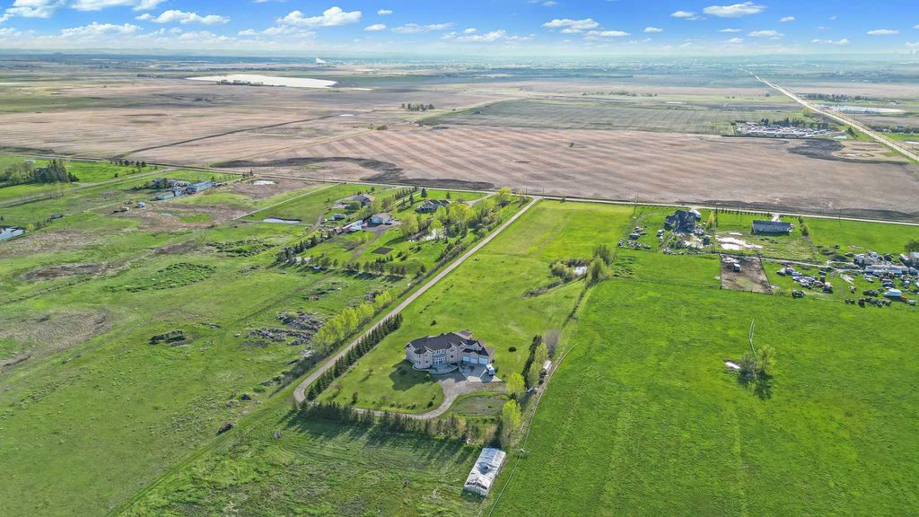 Photo of 235200 Range Road 281, Rural Rocky View County, AB T2P 2G7 (MLS # A2292227)