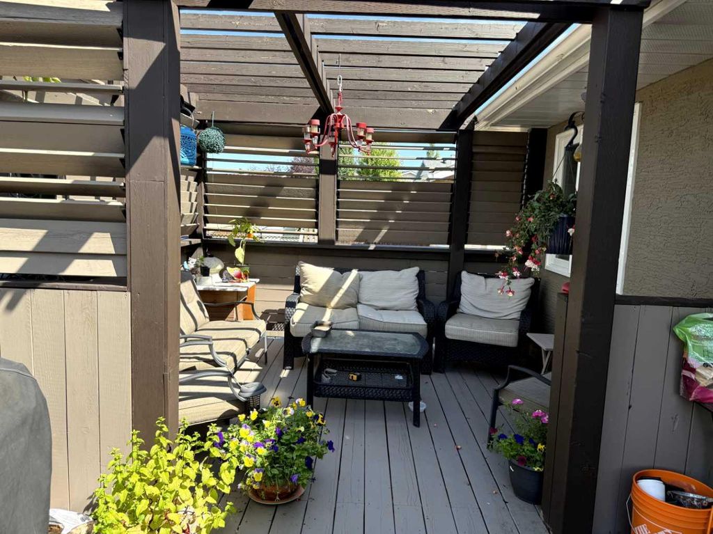 Photo of 1328 Meadowbrook Drive SE, Airdrie, AB T4A 2A3 (MLS # A2286730)