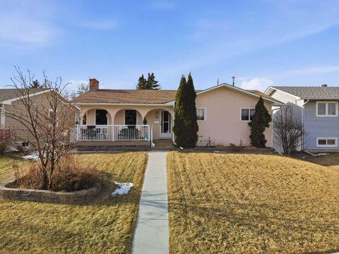 63 Huntmeadow Road NE Calgary AB T2K 5H2