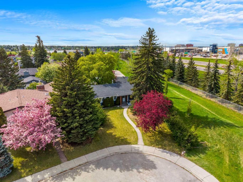 Photo of 235 Lake Rosen Crescent SE, Calgary, AB T2J 3L9 (MLS # A2306126)