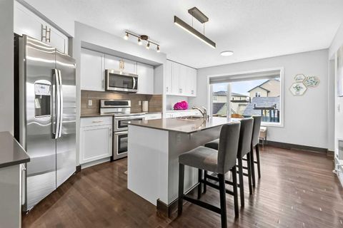 Photo of 102 Panatella Hill NW, Calgary, AB T3K 0B6 (MLS # A2328655)