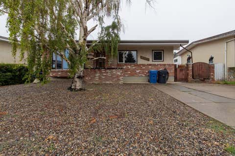 Photo of 1813 21 Avenue N, Lethbridge, AB T1H 4H3 (MLS # A2337138)