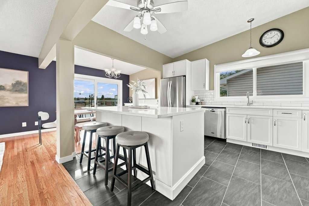 Photo of 6051 Dalgetty Drive NW, Calgary, AB T3A 1J4 (MLS # A2320900)