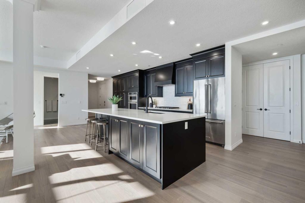 Photo of 180 Marina Cove SE #101, Calgary, AB T3M 3P4 (MLS # A2236030)