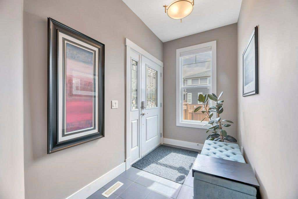Photo of 233 Sandpiper Boulevard, Chestermere, AB T1X 0V5 (MLS # A2317845)