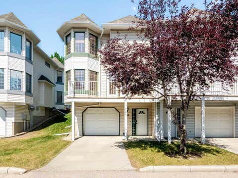 Photo of 81 Prominence View SW, Calgary, AB T3H 3M8 (MLS # A2333282)