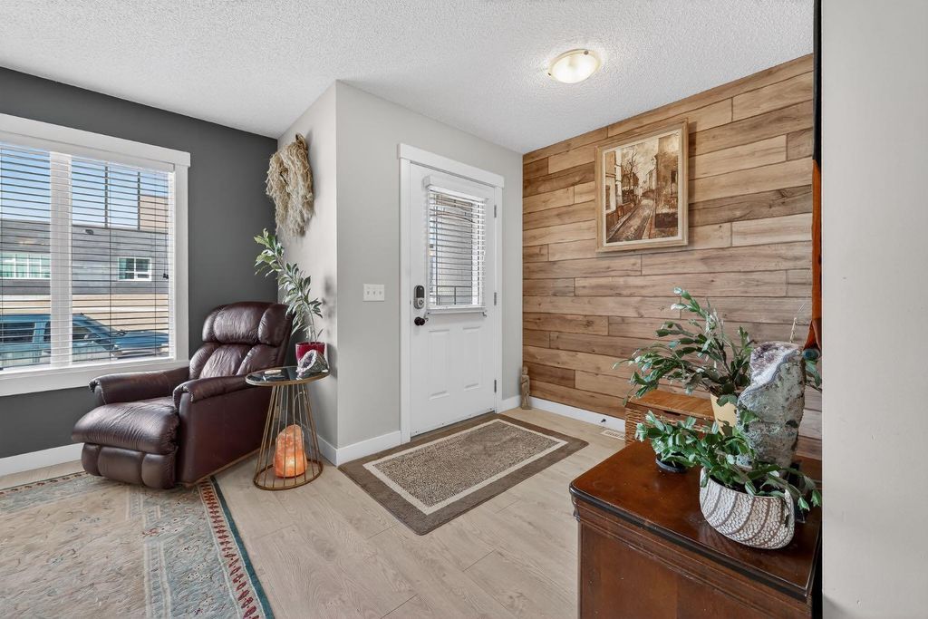 Photo of 203 Fireside Parkway, Cochrane, AB T4C 0V8 (MLS # A2296249)