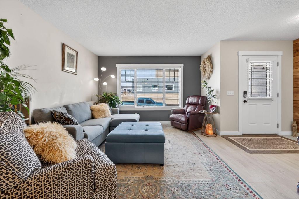 Photo of 203 Fireside Parkway, Cochrane, AB T4C 0V8 (MLS # A2296249)