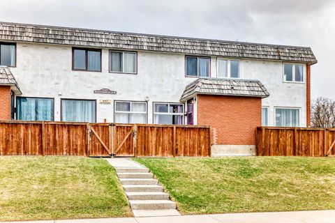 Photo of 6147 Buckthorn Road NW #2, Calgary, AB T2K 2Z2 (MLS # A2309737)