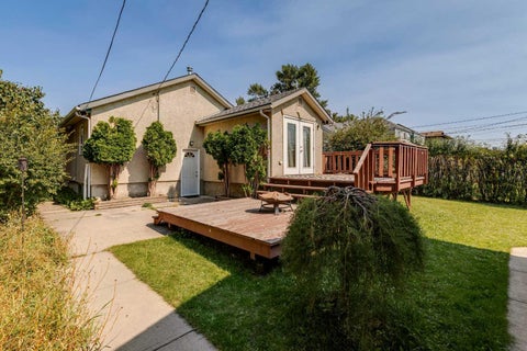 Photo of 415 51 Avenue SW, Calgary, AB T2V 0A2 (MLS # A2344104)