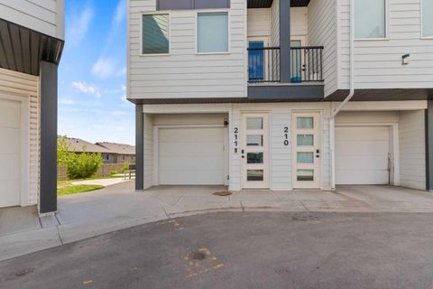 Photo of 101 Panatella Square NW #211, Calgary, AB T3K 2R9 (MLS # A2313128)