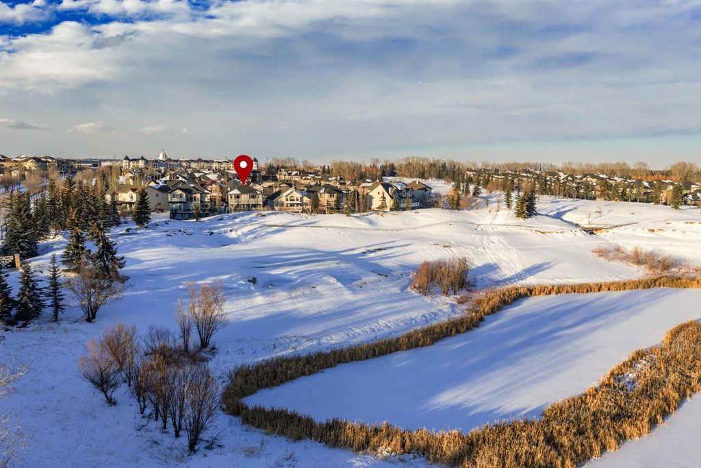 Photo of 515 Crystal Green Mews, Okotoks, AB T1S 2K6 (MLS # A2305473)