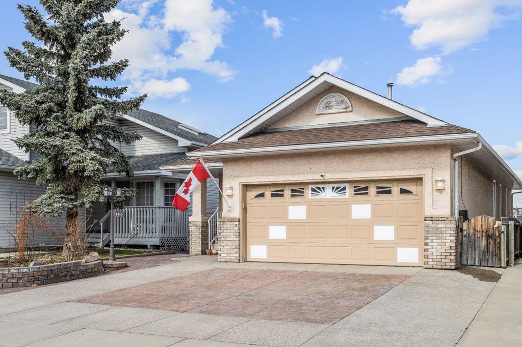 Photo of 180 Hidden Vale Close NW, Calgary, AB T3A 5C7 (MLS # A2318828)