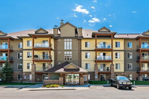 Photo of 92 Crystal Shores Road #1402, Okotoks, AB T1S 2M8 (MLS # A2316793)
