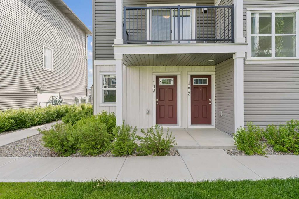Photo of 24 Rivercrest Drive #1001, Cochrane, AB T4C 2V2 (MLS # A2323895)