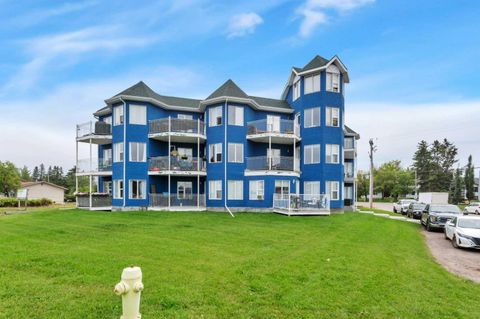 Photo of 5135 Lakeshore Drive Dr #312, Sylvan Lake, AB T4S 1E2 (MLS # A2330100)