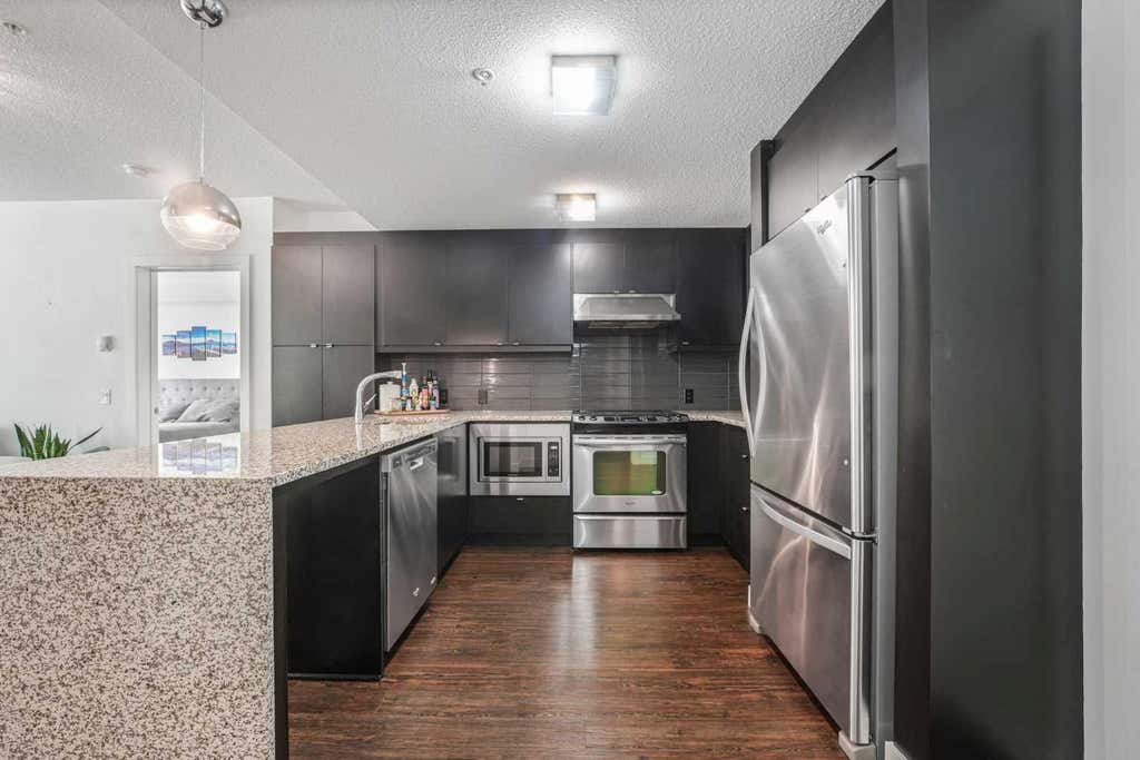 Photo of 25 Aspenmont Heights SW #111, Calgary, AB T3H 0E4 (MLS # A2327471)