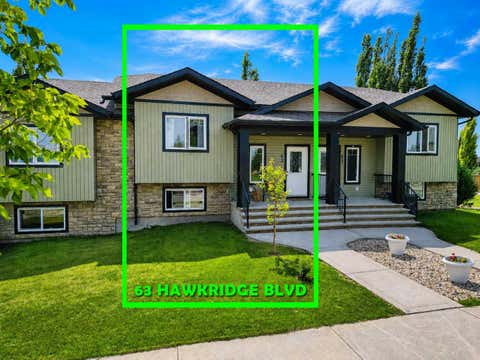 Photo of 63 Hawkridge Boulevard, Penhold, AB T0M 1R0 (MLS # A2330453)