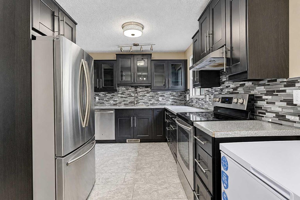Photo of 9449 69 Avenue, Grande Prairie, AB T8V 5W6 (MLS # A2345521)
