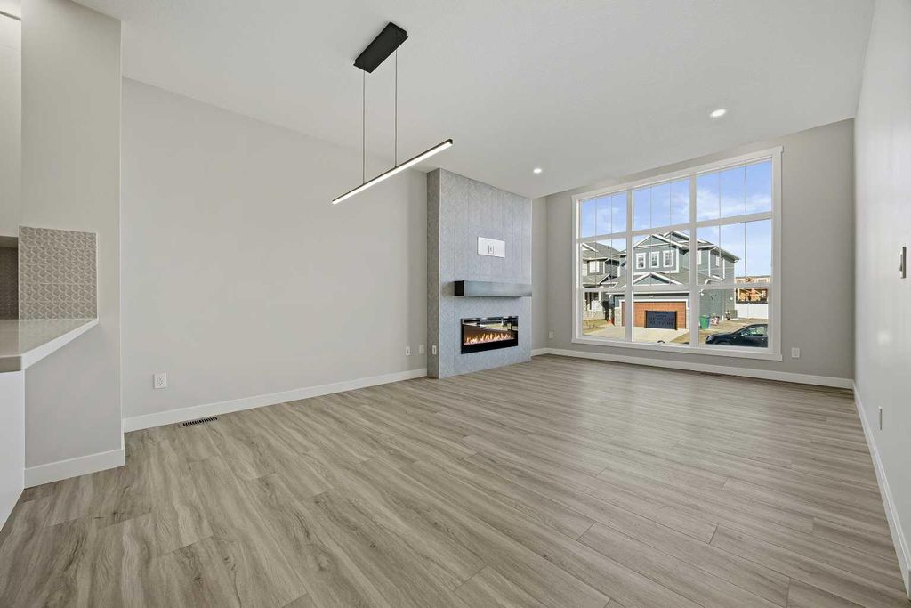 Photo of 1047 Bayview Crescent, Airdrie, AB T4B 5N5 (MLS # A2296198)