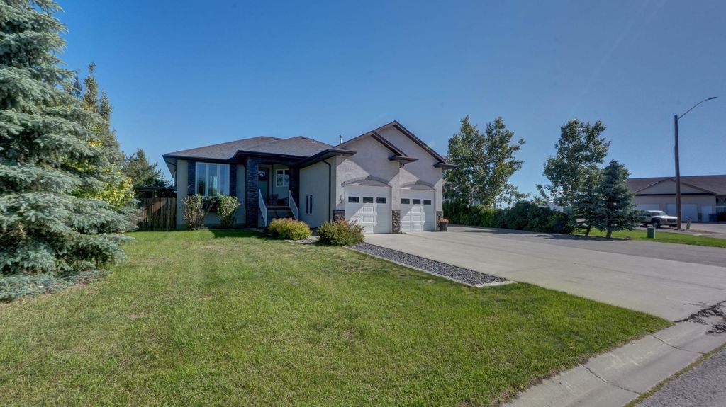 Photo of 106 Derochie Drive W, Claresholm, AB T0L 0T0 (MLS # A2323282)
