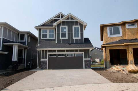 Photo of 127 Sundown Crescent, Cochrane, AB T4C 1Y3 (MLS # A2330966)