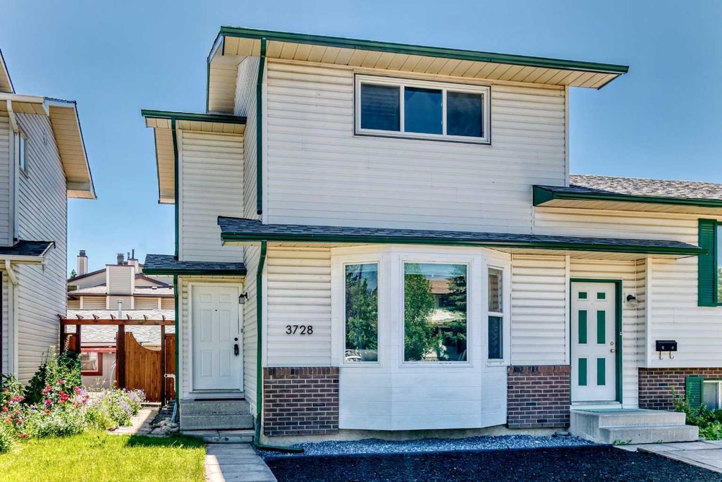 Photo of 3728 Cedarille Drive SW, Calgary, AB T2W 3Z8 (MLS # A2326804)