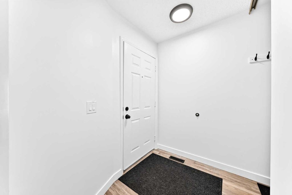 Photo of 3728 Cedarille Drive SW, Calgary, AB T2W 3Z8 (MLS # A2326804)