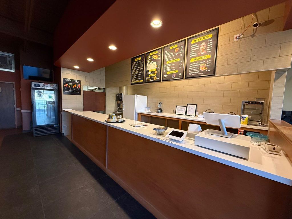Photo of 101 SUNSET BLVD NW Blvd #UNIT 4, Diamond Valley, AB T0L 2A0 (MLS # A2264475)