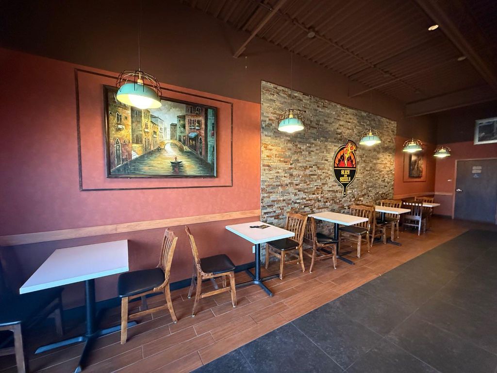 Photo of 101 SUNSET BLVD NW Blvd #UNIT 4, Diamond Valley, AB T0L 2A0 (MLS # A2264475)