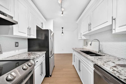 Photo of 8948 Elbow Drive SW #503, Calgary, AB T2V 0H9 (MLS # A2337469)