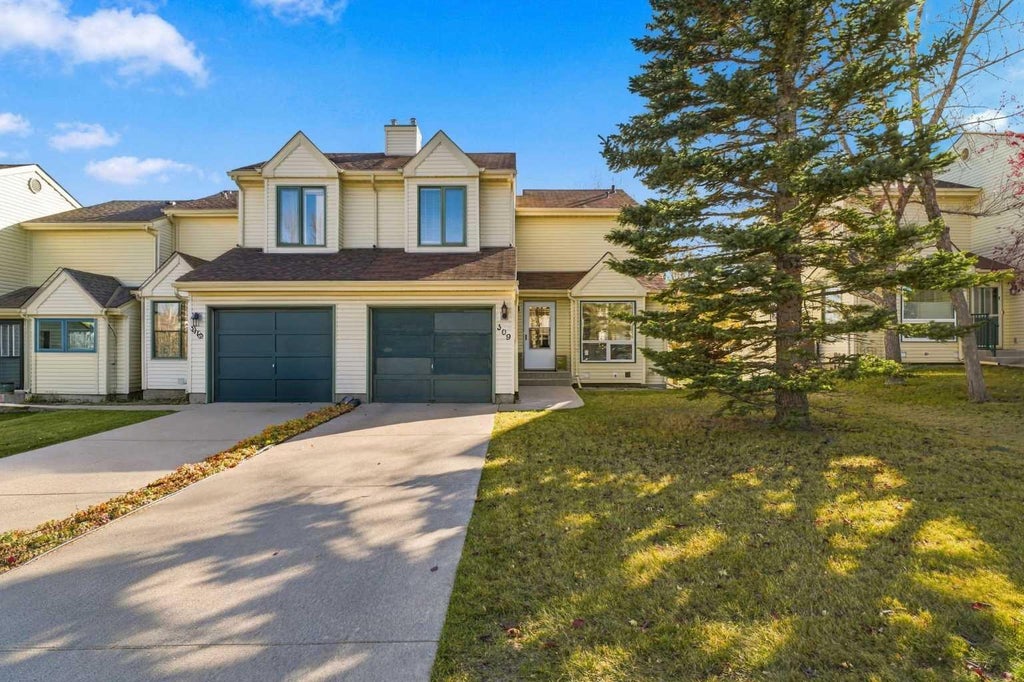 Photo of 309 Sandringham Road NW, Calgary, AB T3K 3Z1 (MLS # A2353352)