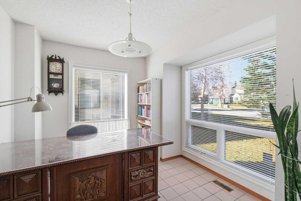 Photo of 309 Sandringham Road NW, Calgary, AB T3K 3Z1 (MLS # A2353352)