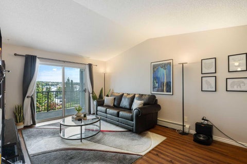 Photo of 33 Arbour Grove Close NW #413, Calgary, AB T3G 4K2 (MLS # A2327073)